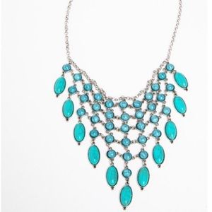 SHYANNE WOMEN'S BLUE FALLS FANCY TURQUOISE BIB NECKLACE

Antique nickel